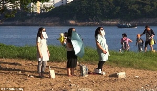 Chine: Pour perdre du poids, les femmes passent leur temps à regarder le soleil (PHOTOS)